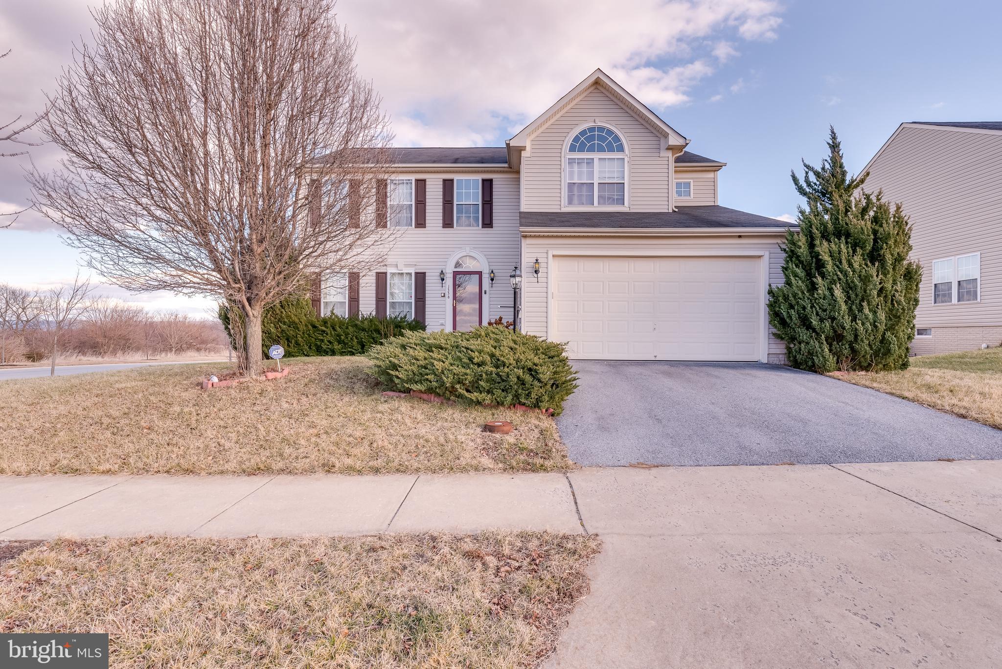 This classic colonial boasts 4 bedrooms, 3.5 baths