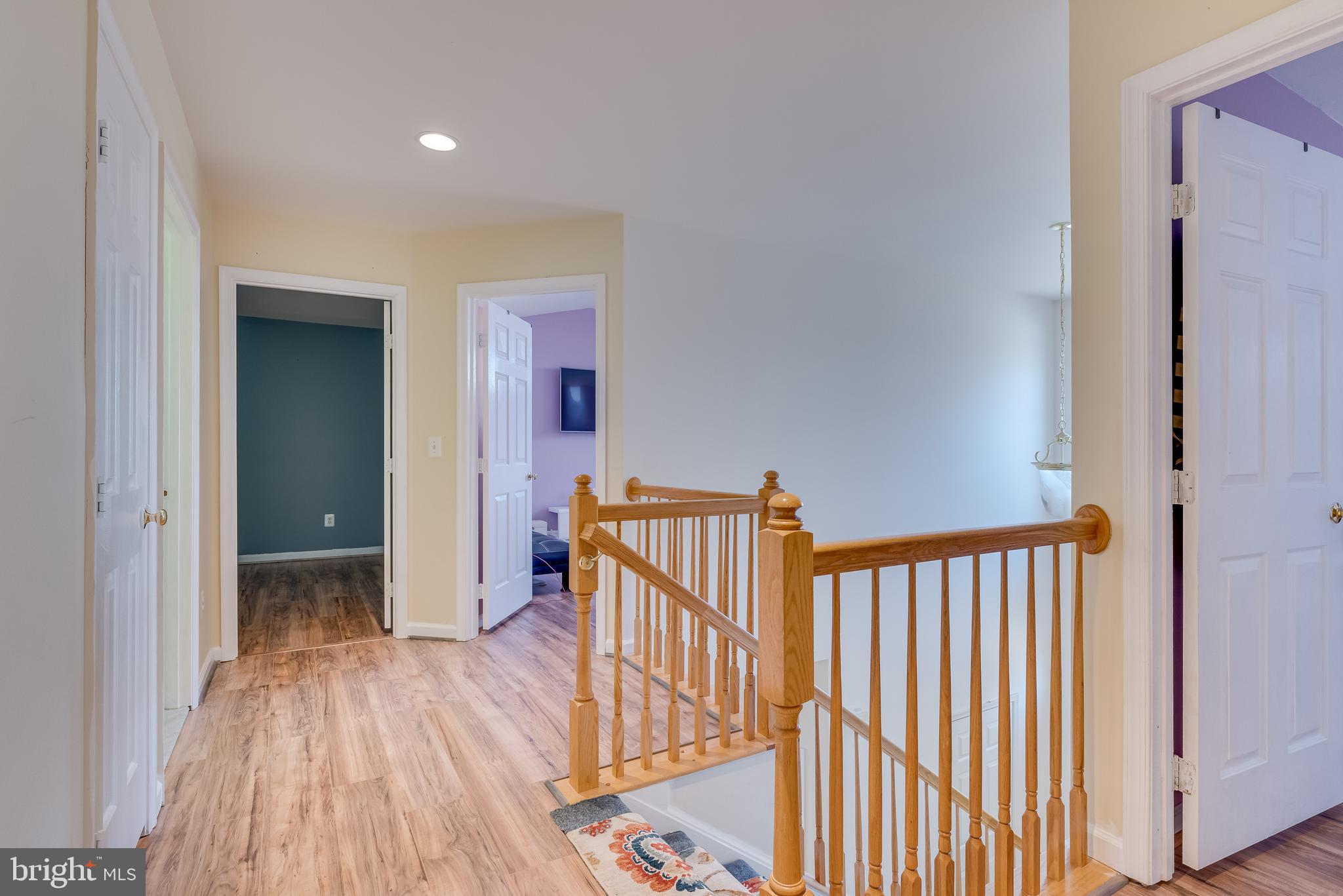 1356 Foal Street Ranson, WV 25438 - Photo 30 of 63 Hallway with new flooring leads to 4 bedrooms