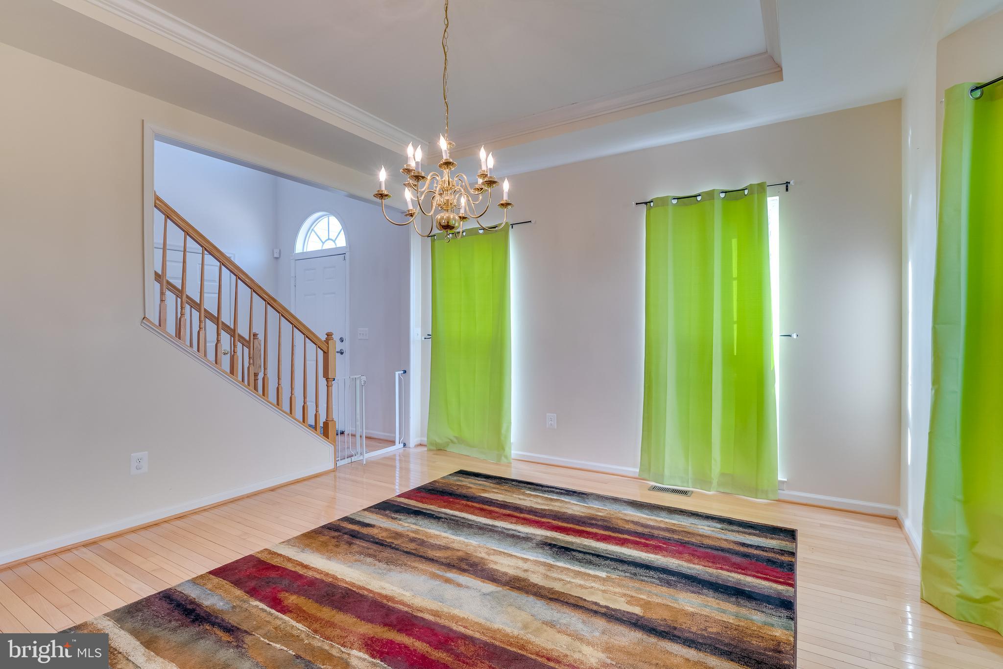1356 Foal Street Ranson, WV 25438 - Photo 9 of 63 Features hardwood, chandelier, and large windows