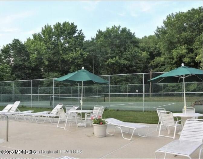91 Paddock Court Oceanport, NJ 07757 - Photo 14 of 17 a view of a patio with a yard