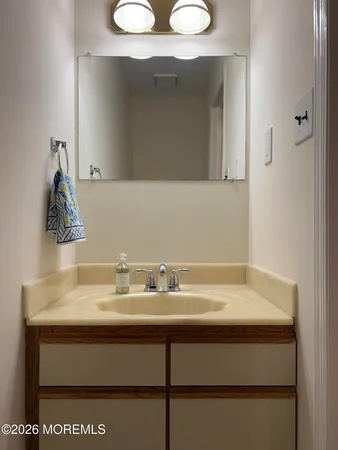 a sink with a mirror