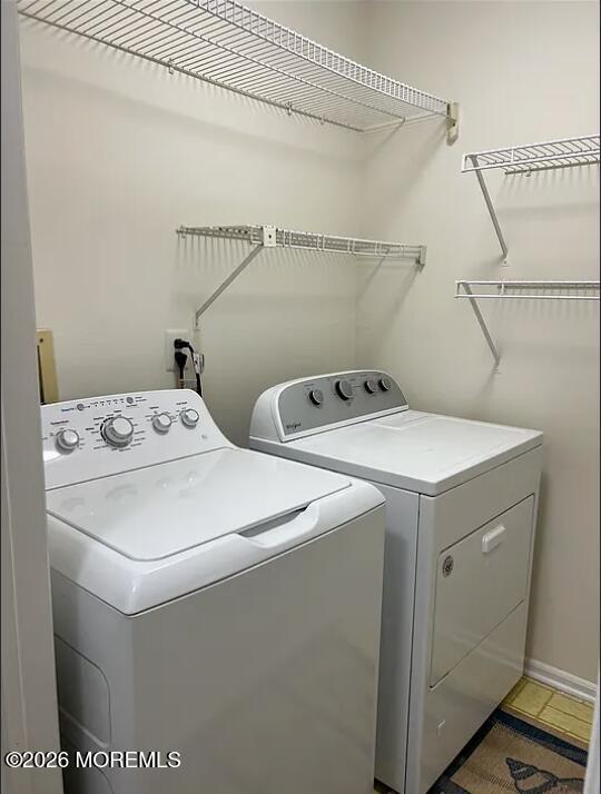 91 Paddock Court Oceanport, NJ 07757 - Photo 10 of 17 a utility room with dryer and washer