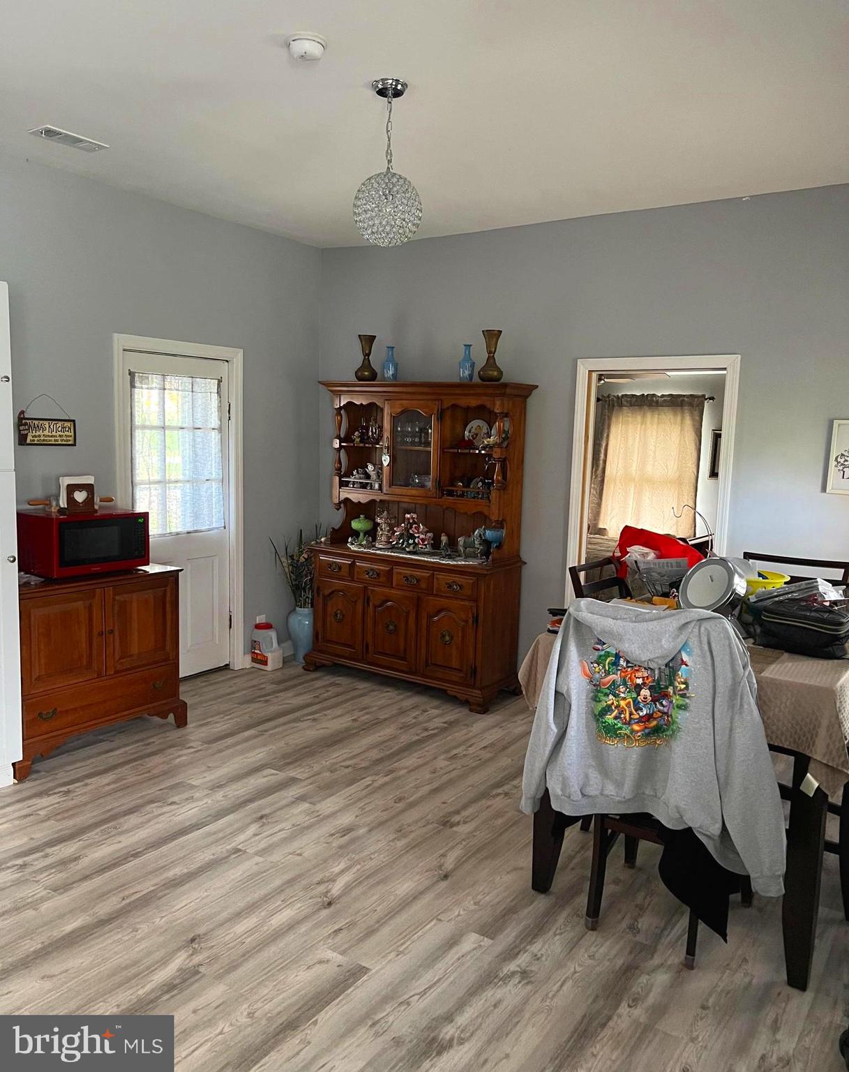 3 Canhouse Road Elmer, NJ 08318 - Photo 20 of 44 a living room with furniture and a wooden floor
