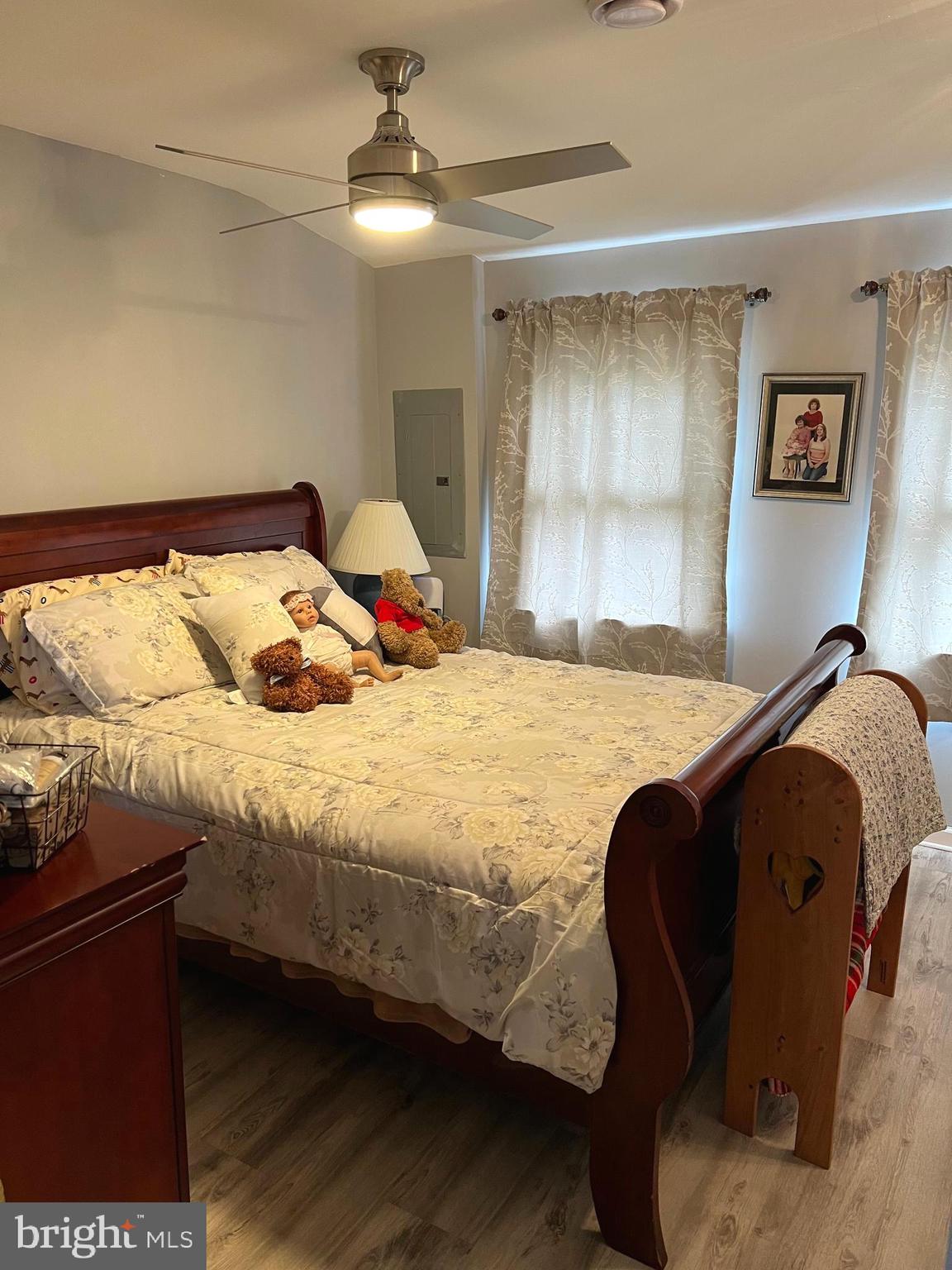 3 Canhouse Road Elmer, NJ 08318 - Photo 21 of 44 a bedroom with a bed and wooden floor