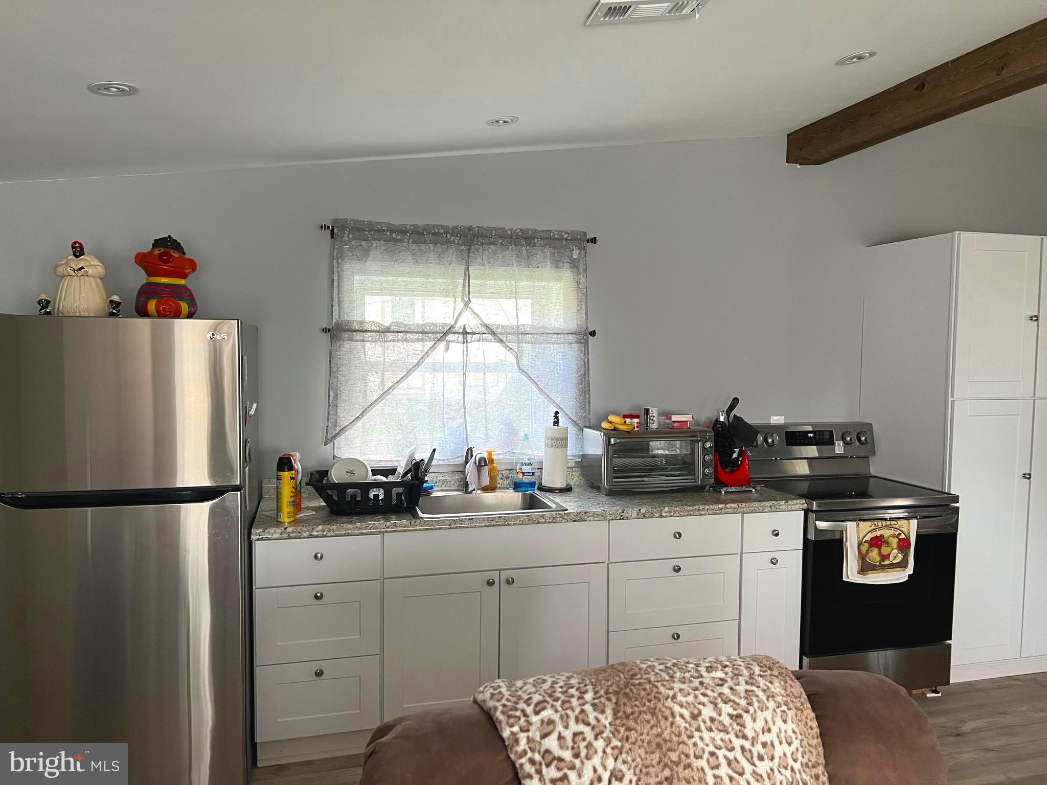 3 Canhouse Road Elmer, NJ 08318 - Photo 26 of 44 a kitchen with a sink dishwasher stove and refrigerator