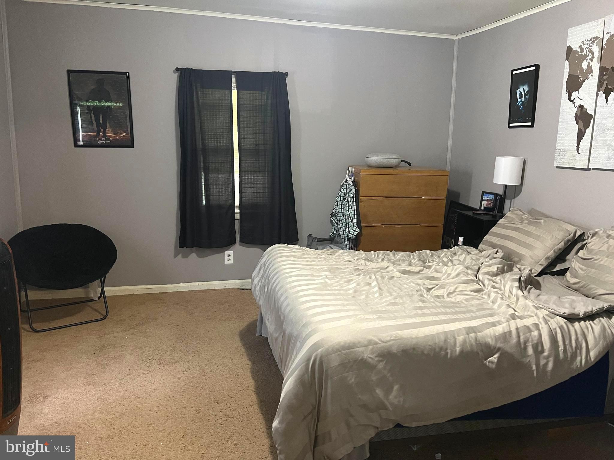 3 Canhouse Road Elmer, NJ 08318 - Photo 5 of 44 a bedroom with a bed and chair