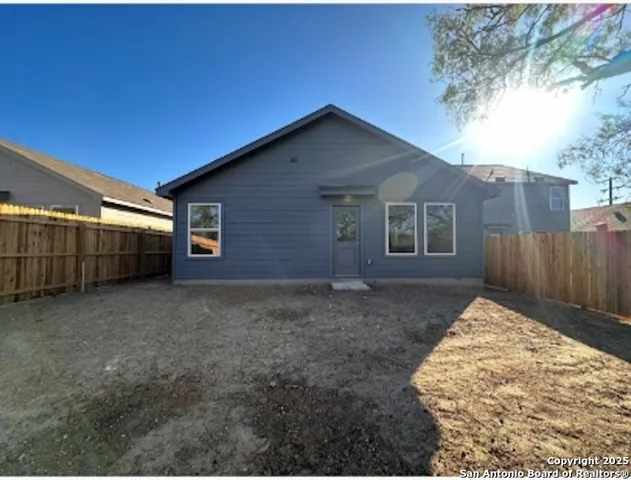 a view of backyard of house