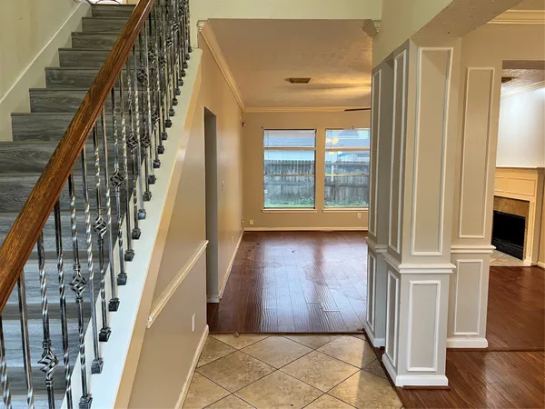 a view of entryway with wooden floor