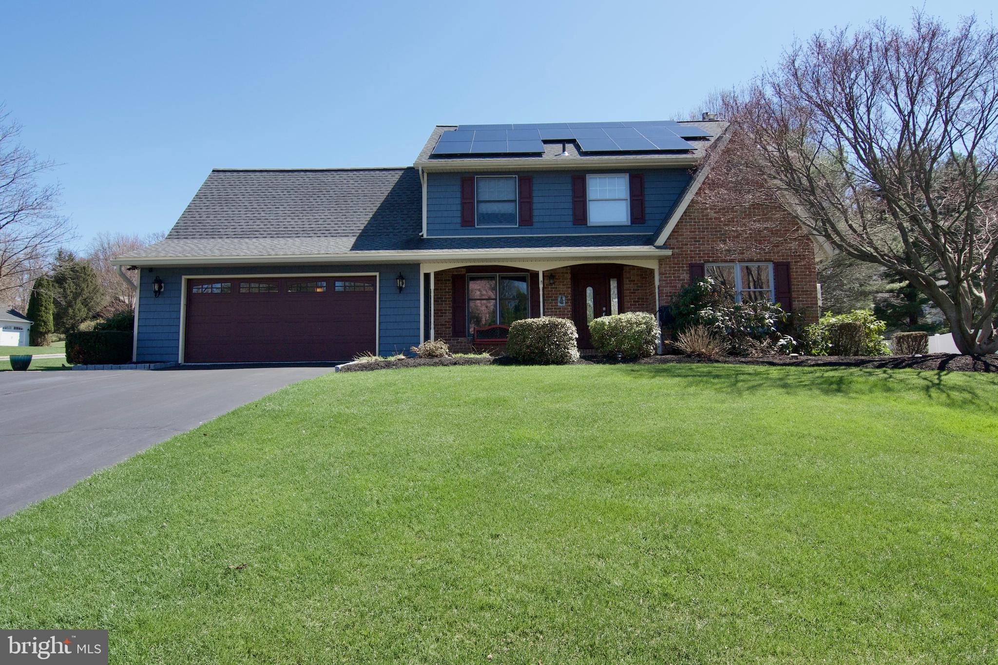 7451 Valley View Lane Reading, PA 19606 - Photo 2 of 61 a front view of house with yard and green space