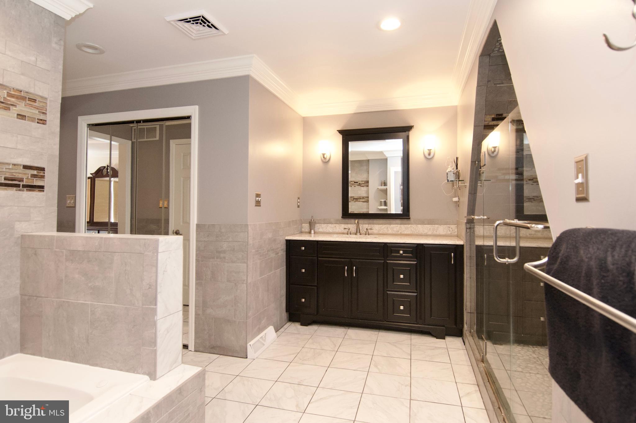 7451 Valley View Lane Reading, PA 19606 - Photo 30 of 61 a bathroom with a sink and a mirror