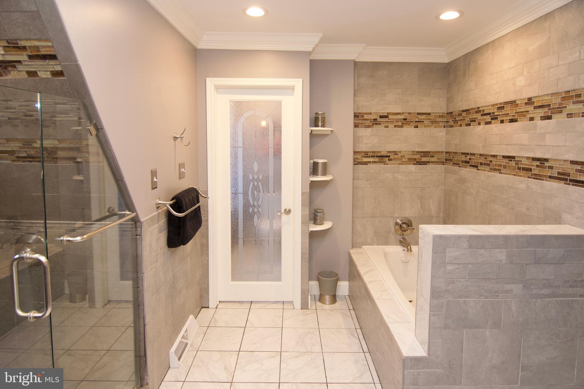 7451 Valley View Lane Reading, PA 19606 - Photo 31 of 61 a bathroom with a glass shower door