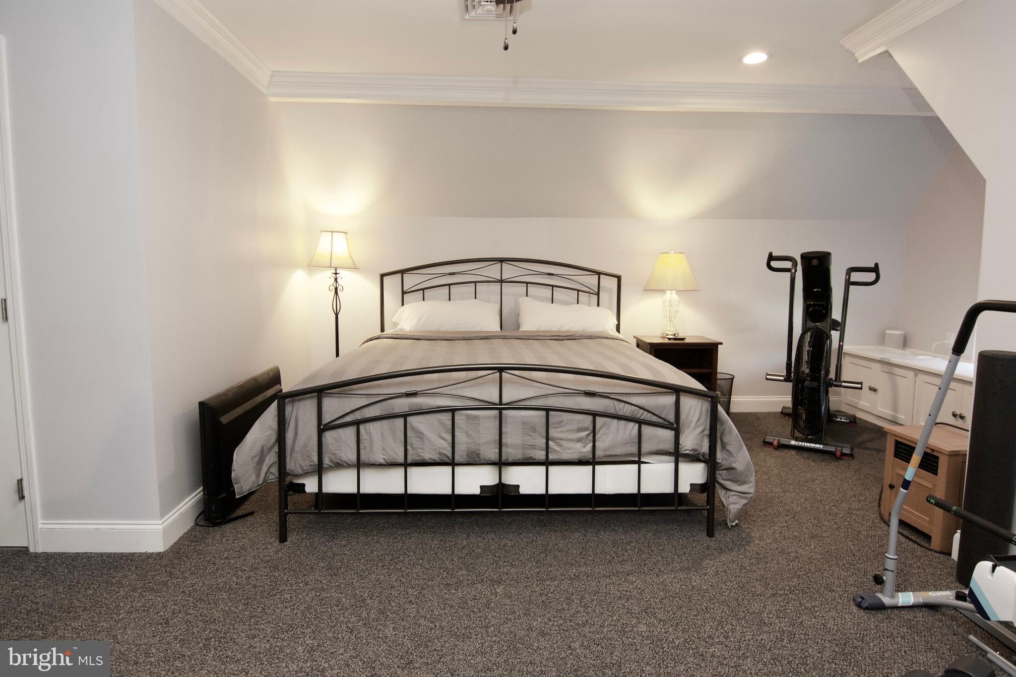 7451 Valley View Lane Reading, PA 19606 - Photo 33 of 61 a bedroom with a bed and a tv in it