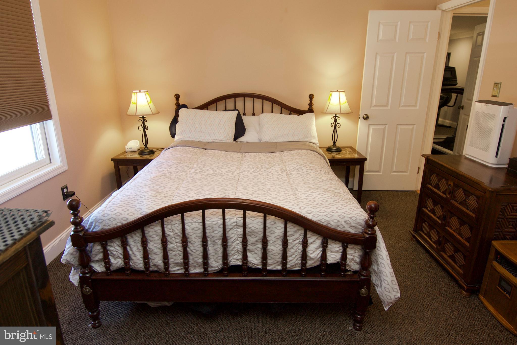 7451 Valley View Lane Reading, PA 19606 - Photo 36 of 61 a bedroom with a bed and a tv