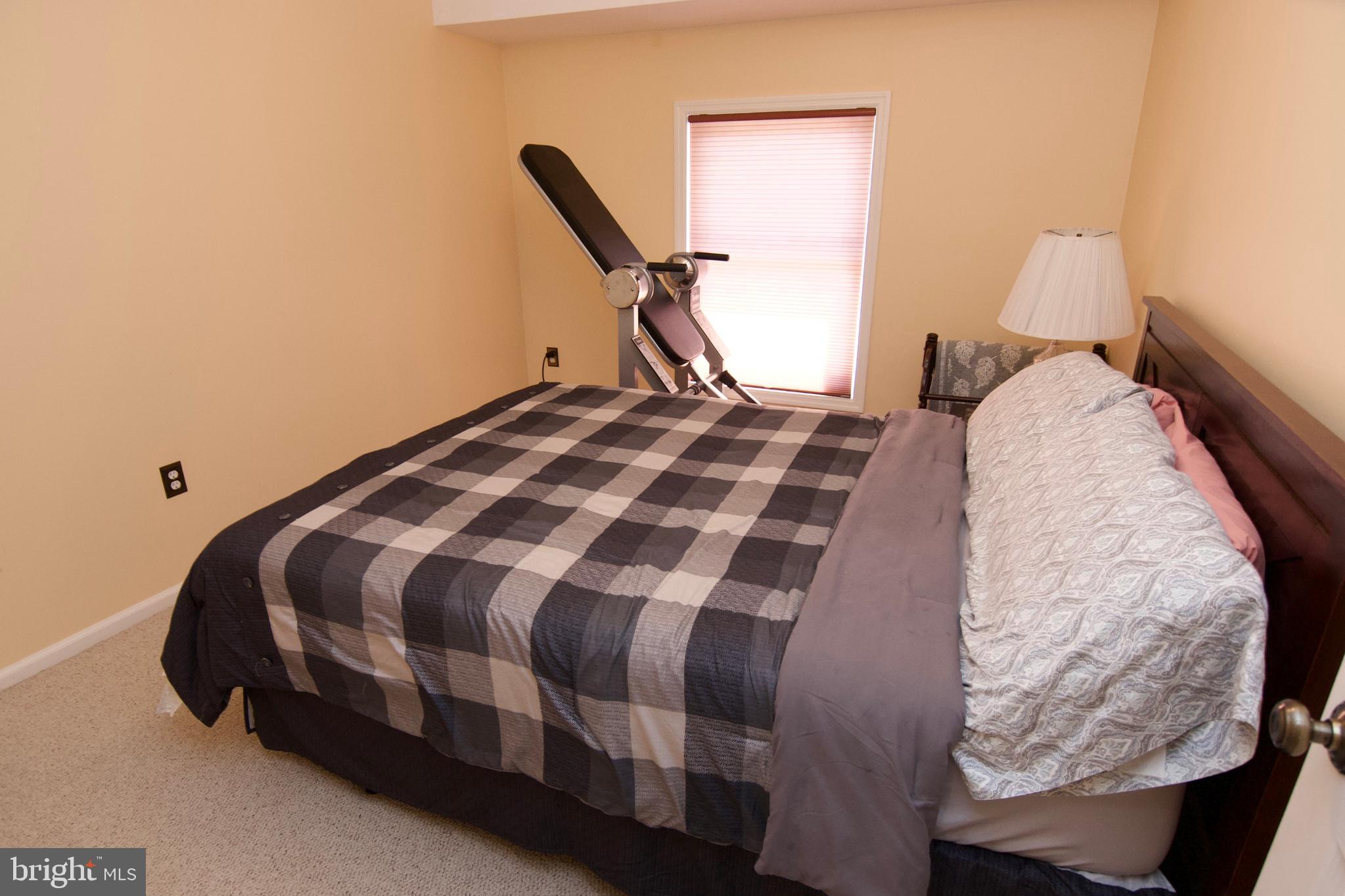 7451 Valley View Lane Reading, PA 19606 - Photo 37 of 61 a bedroom with a bed and a window