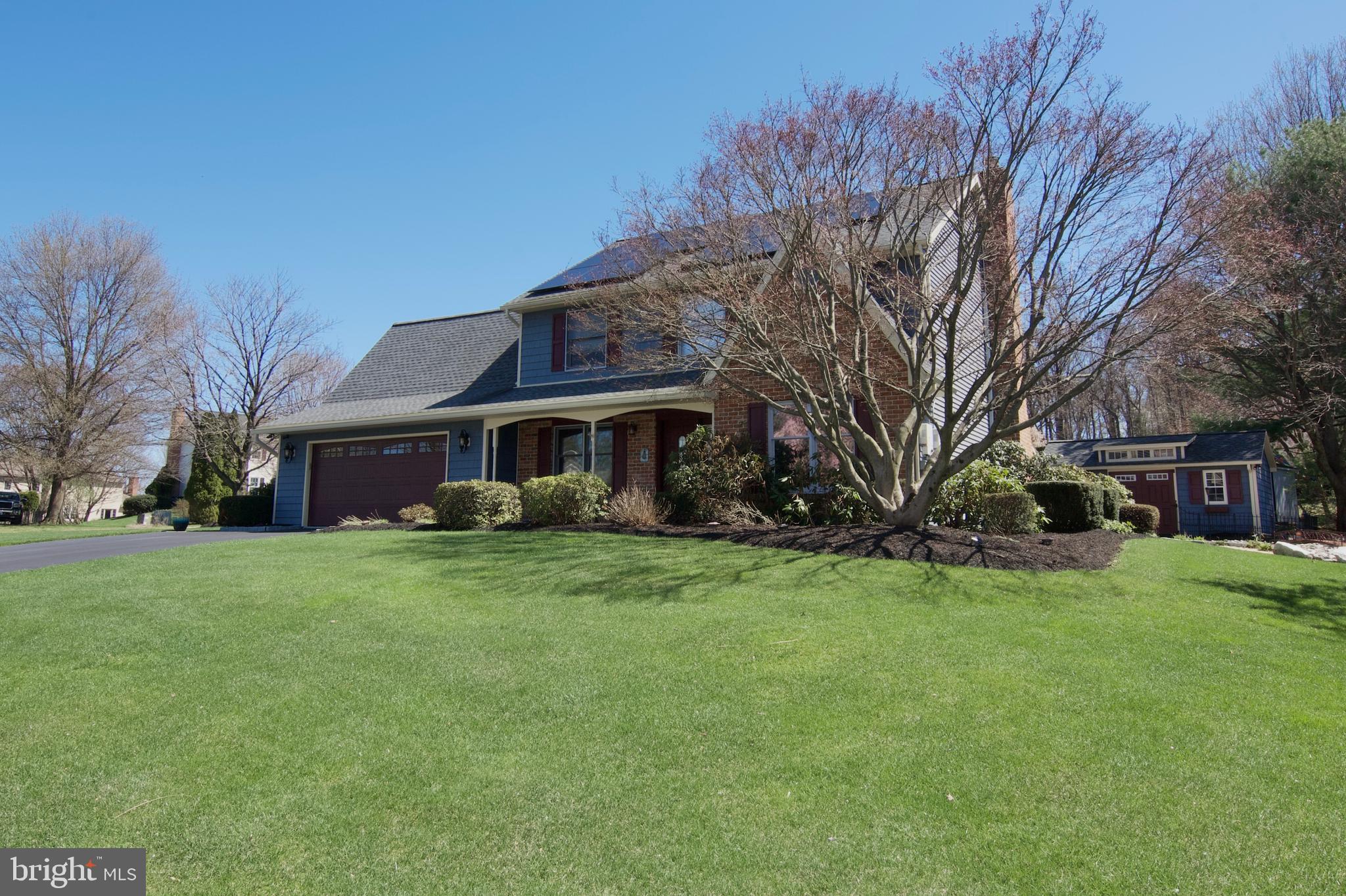 7451 Valley View Lane Reading, PA 19606 - Photo 4 of 61 a front view of a house with a yard