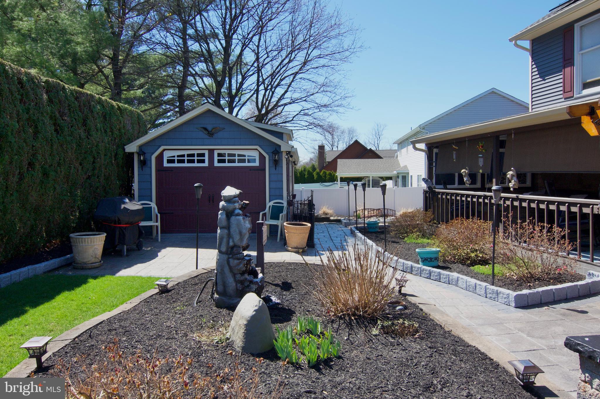 7451 Valley View Lane Reading, PA 19606 - Photo 54 of 61 a front view of a house with a yard table and chairs