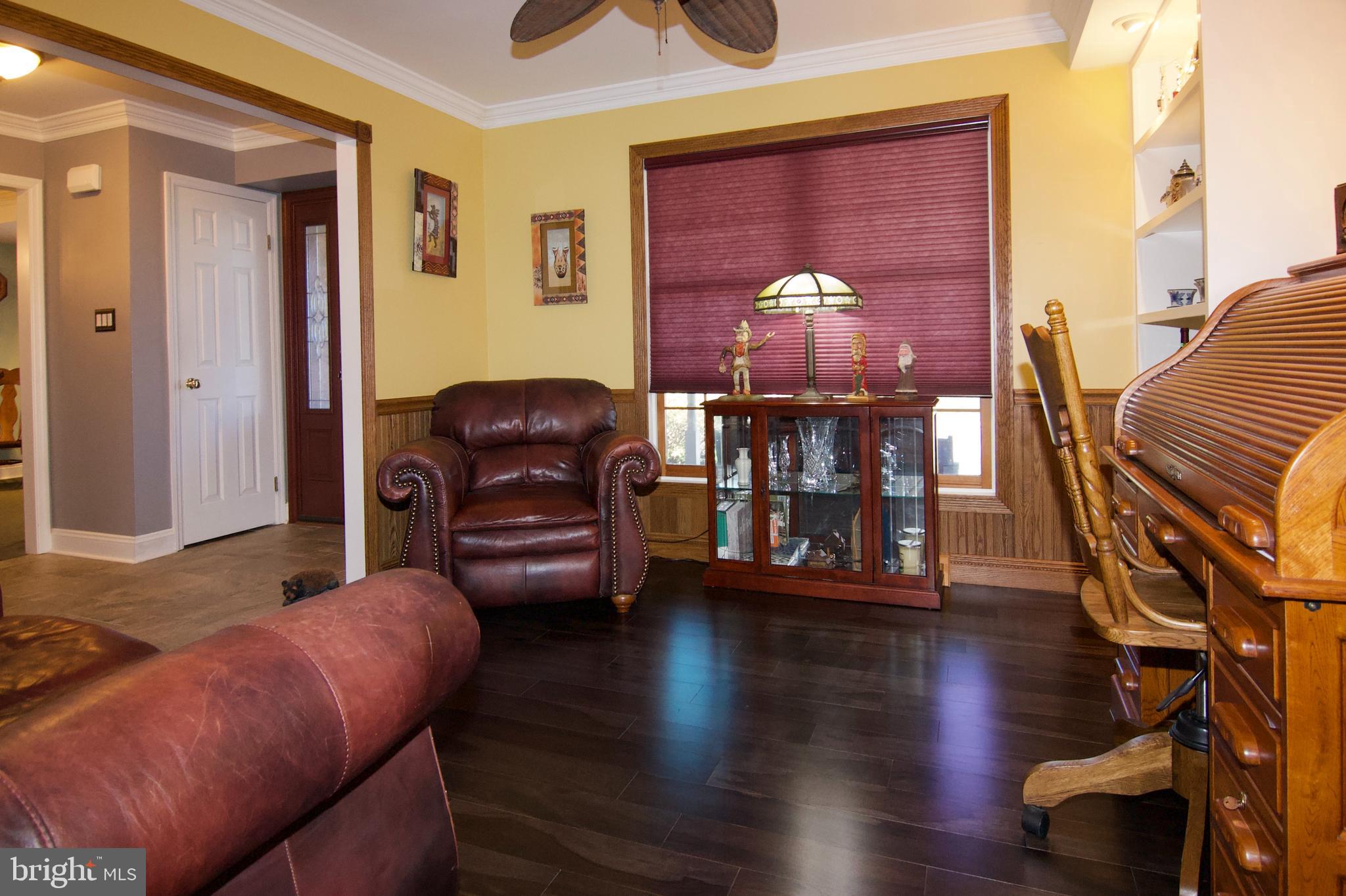 7451 Valley View Lane Reading, PA 19606 - Photo 9 of 61 a living room with furniture and wooden floor