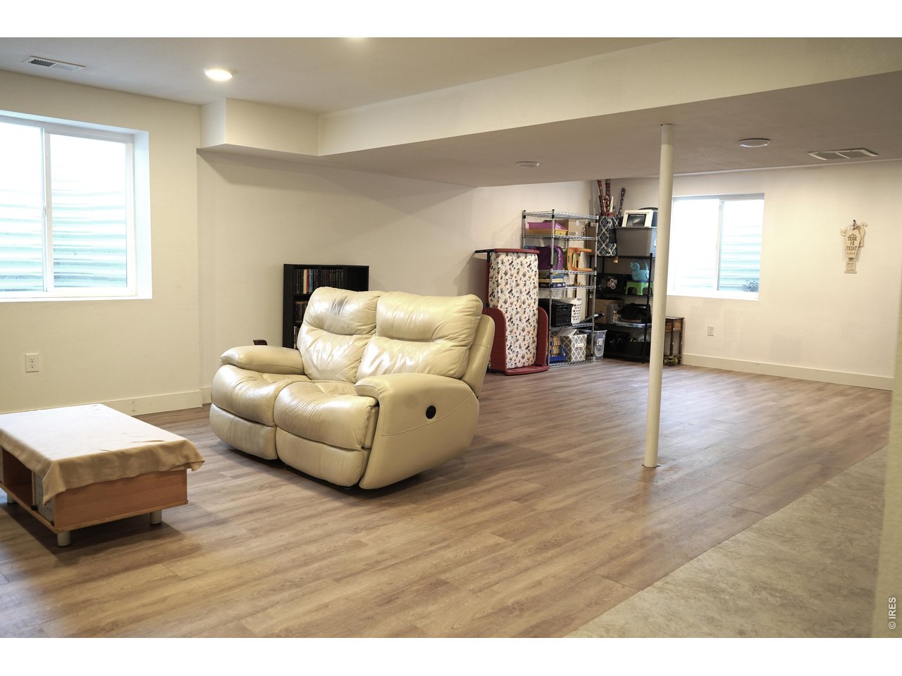 5627 West 16th Street Road Greeley, CO 80634 - Photo 14 of 20 Large rec/family room with new LV flooring and Cat 8 wiring