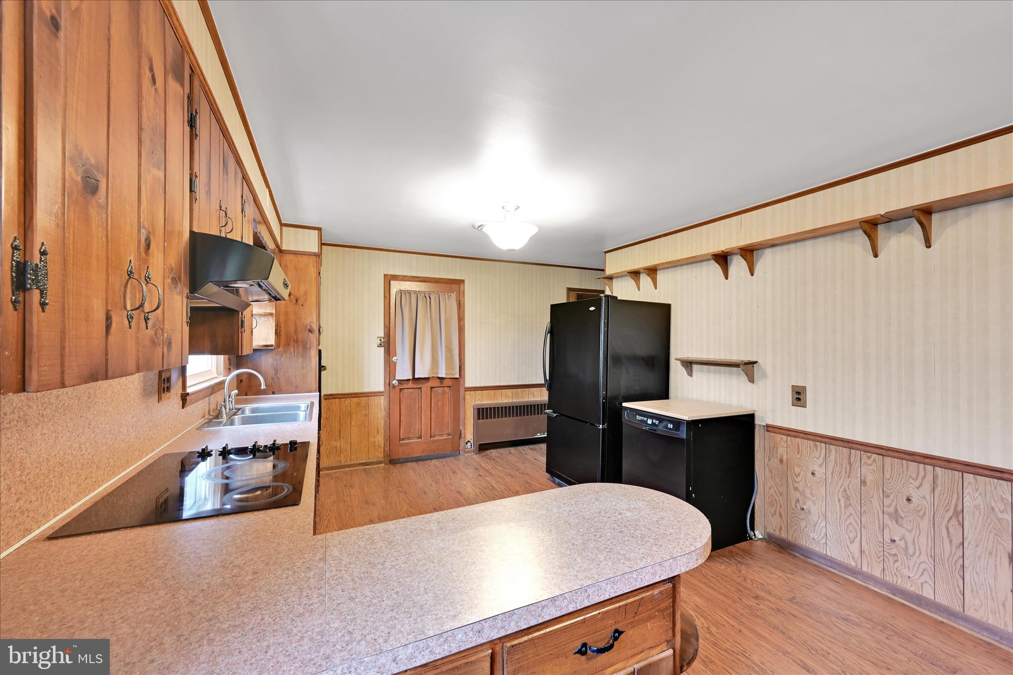 5030 Yorkana Road York, PA 17406 - Photo 12 of 31 a view of kitchen with cabinets and wooden floor