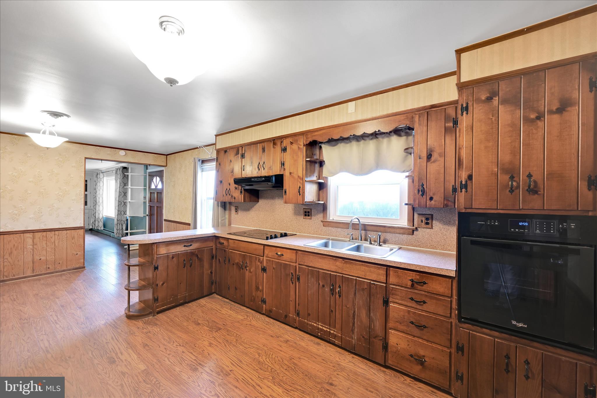 5030 Yorkana Road York, PA 17406 - Photo 13 of 31 a kitchen with stainless steel appliances granite countertop a sink and cabinets