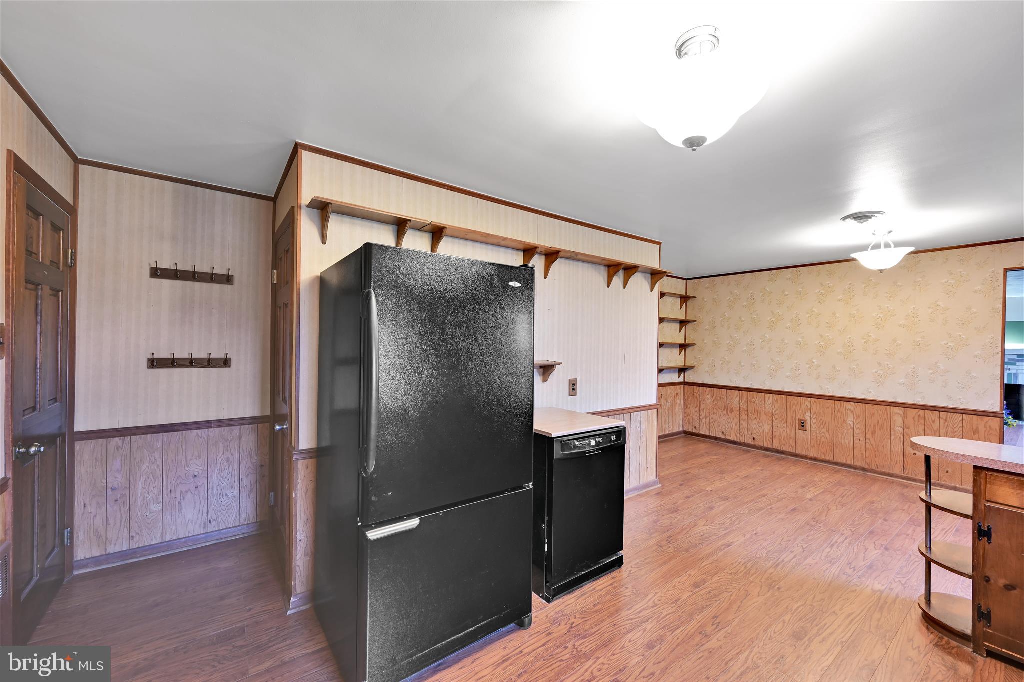 5030 Yorkana Road York, PA 17406 - Photo 14 of 31 a kitchen with stainless steel appliances a refrigerator and wooden floor