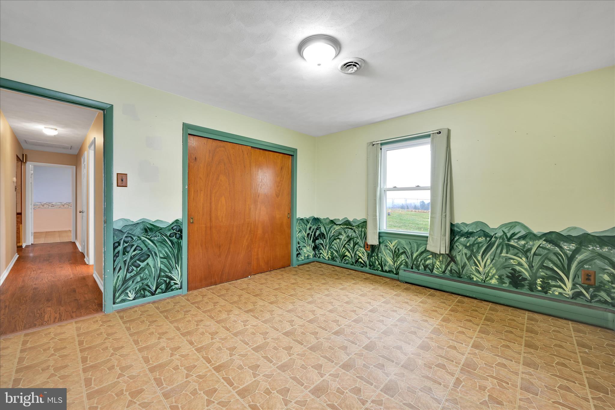5030 Yorkana Road York, PA 17406 - Photo 16 of 31 a view of a bedroom with window and hardwood floor