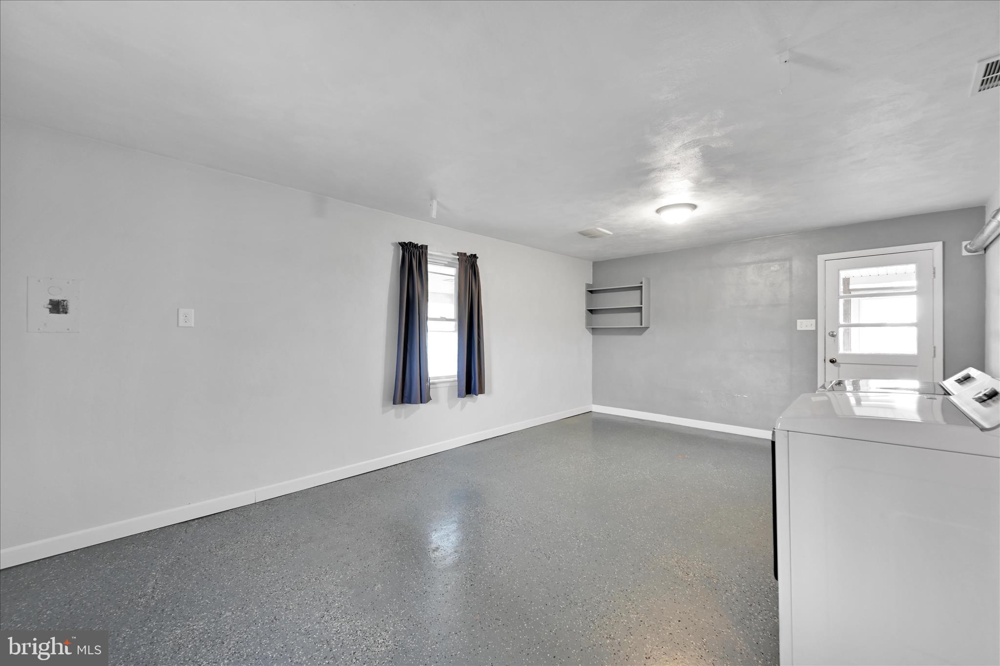 5030 Yorkana Road York, PA 17406 - Photo 21 of 31 wooden floor in an empty room with a window