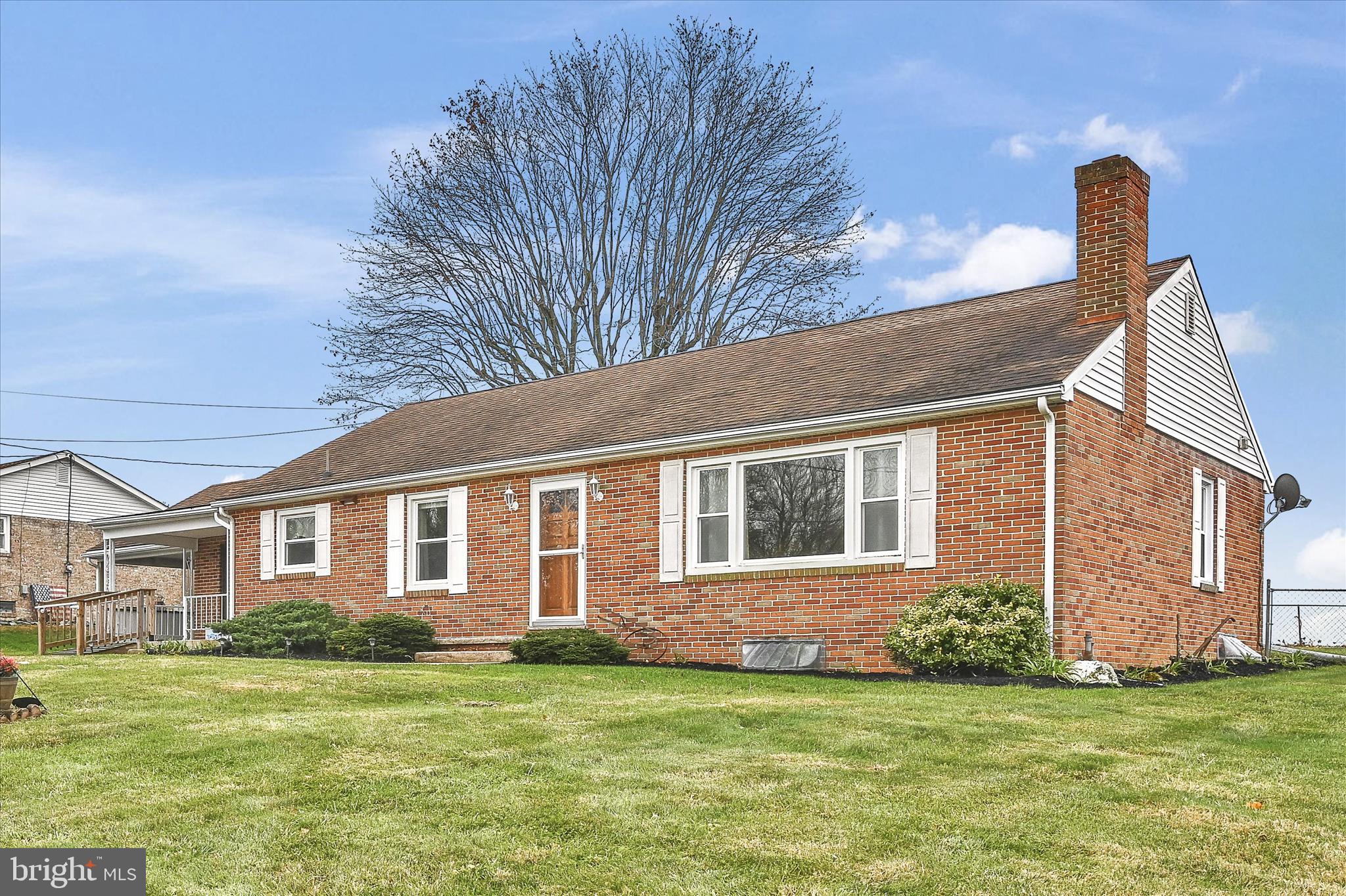 5030 Yorkana Road York, PA 17406 - Photo 5 of 31 a front view of a house with a garden