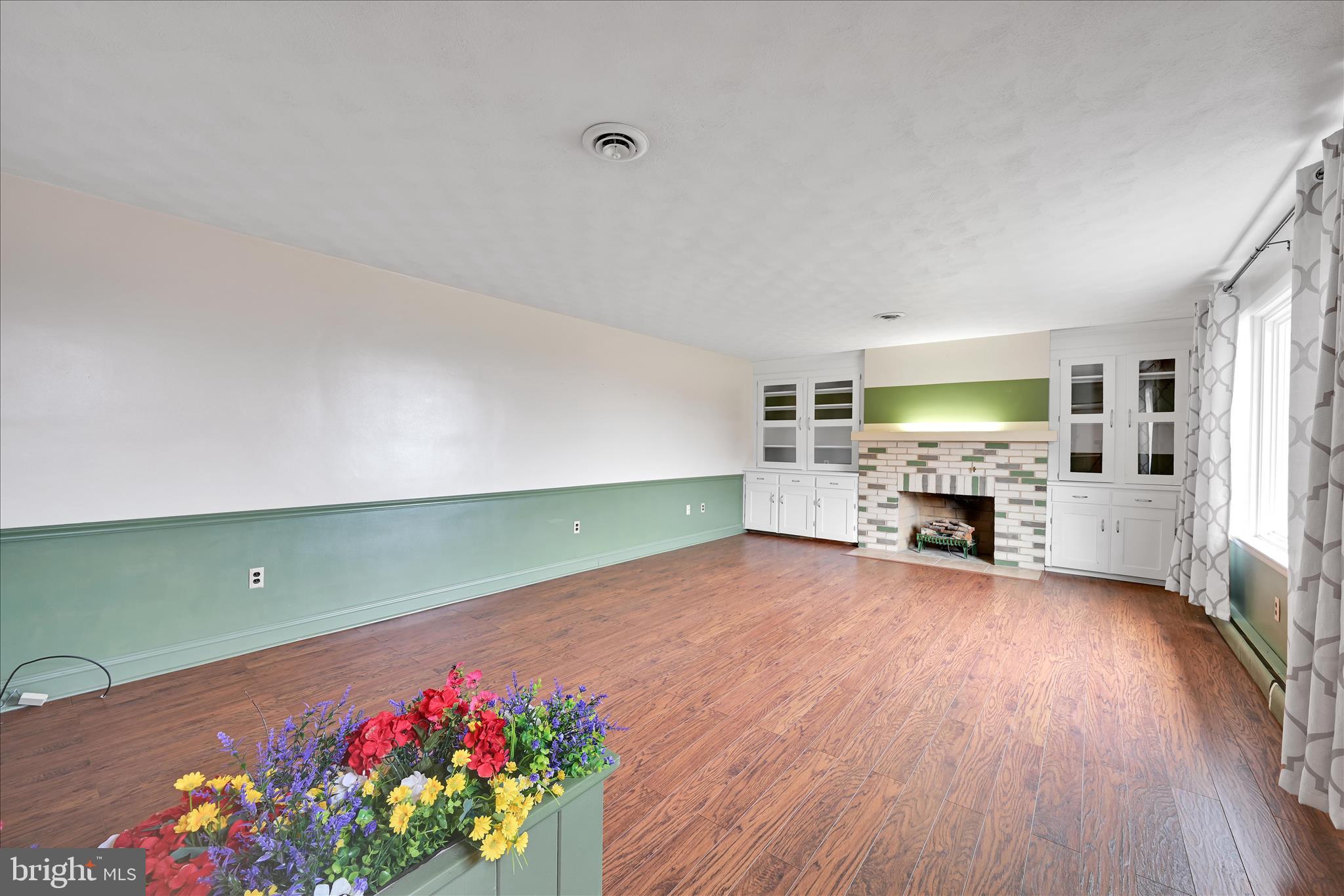 5030 Yorkana Road York, PA 17406 - Photo 7 of 31 a living room with furniture and flowers