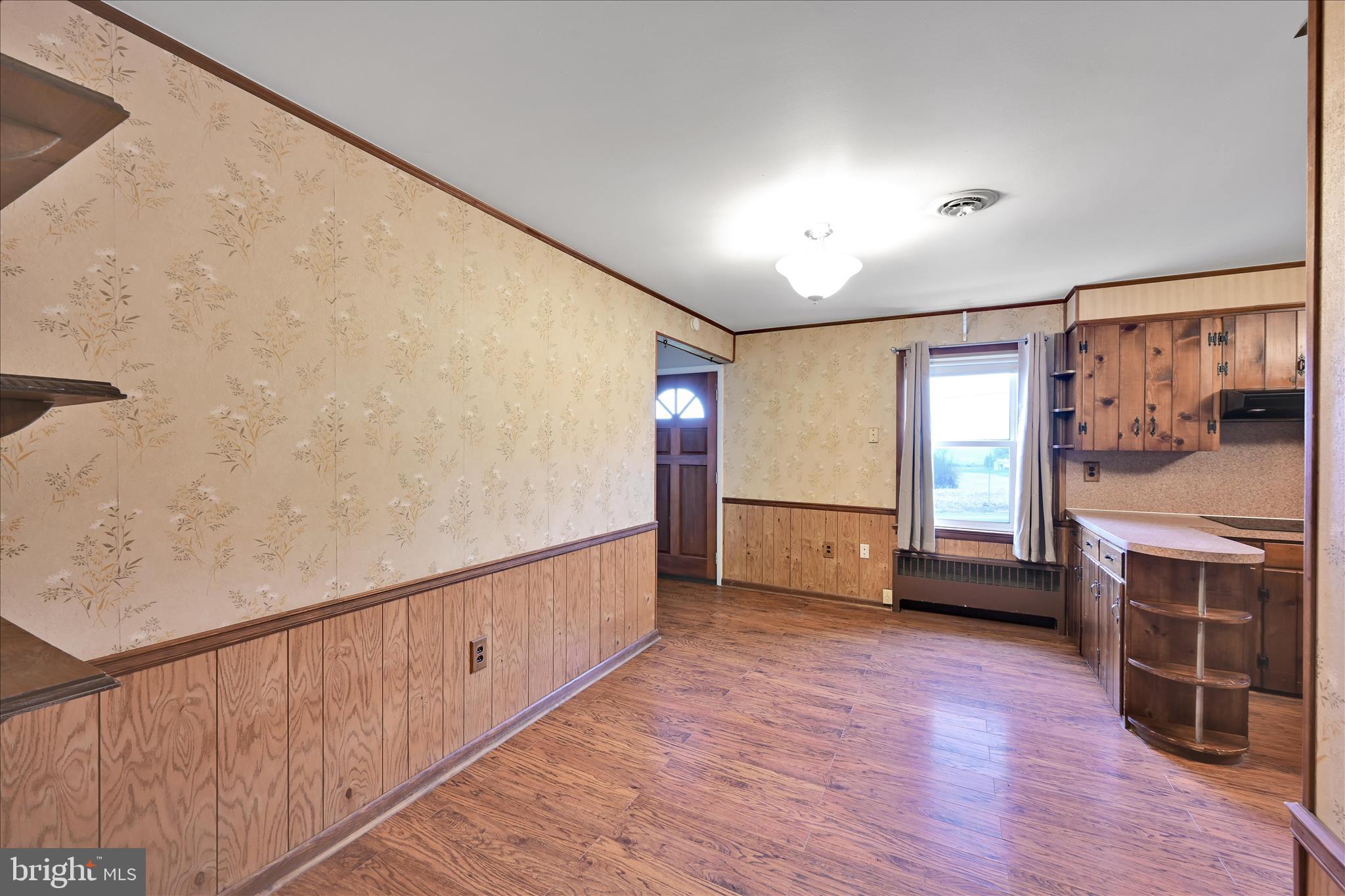 5030 Yorkana Road York, PA 17406 - Photo 10 of 31 a view of hallway with stairs and wooden floor