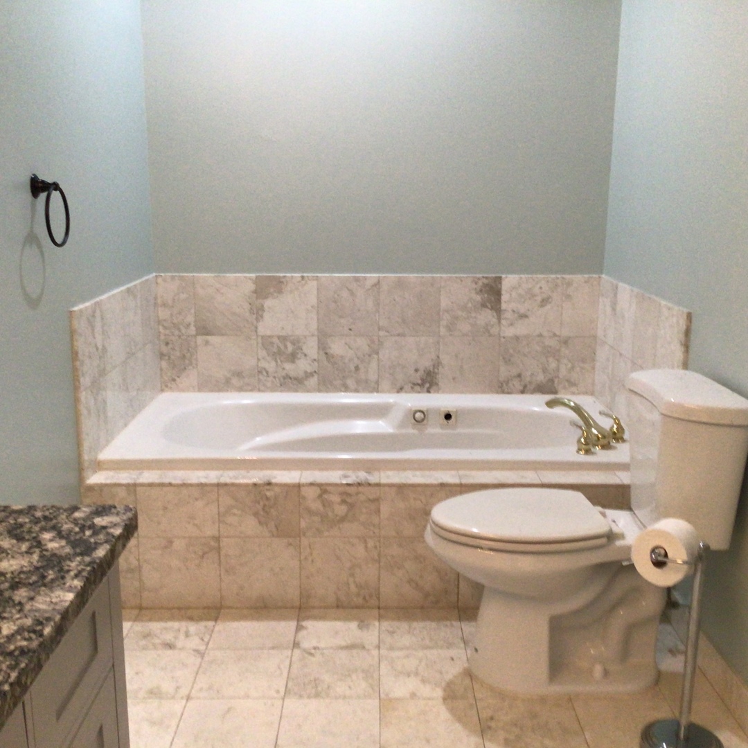 Undisclosed Address Chicago, IL 60642 - Photo 13 of 24 a bathroom with a sink and a toilet