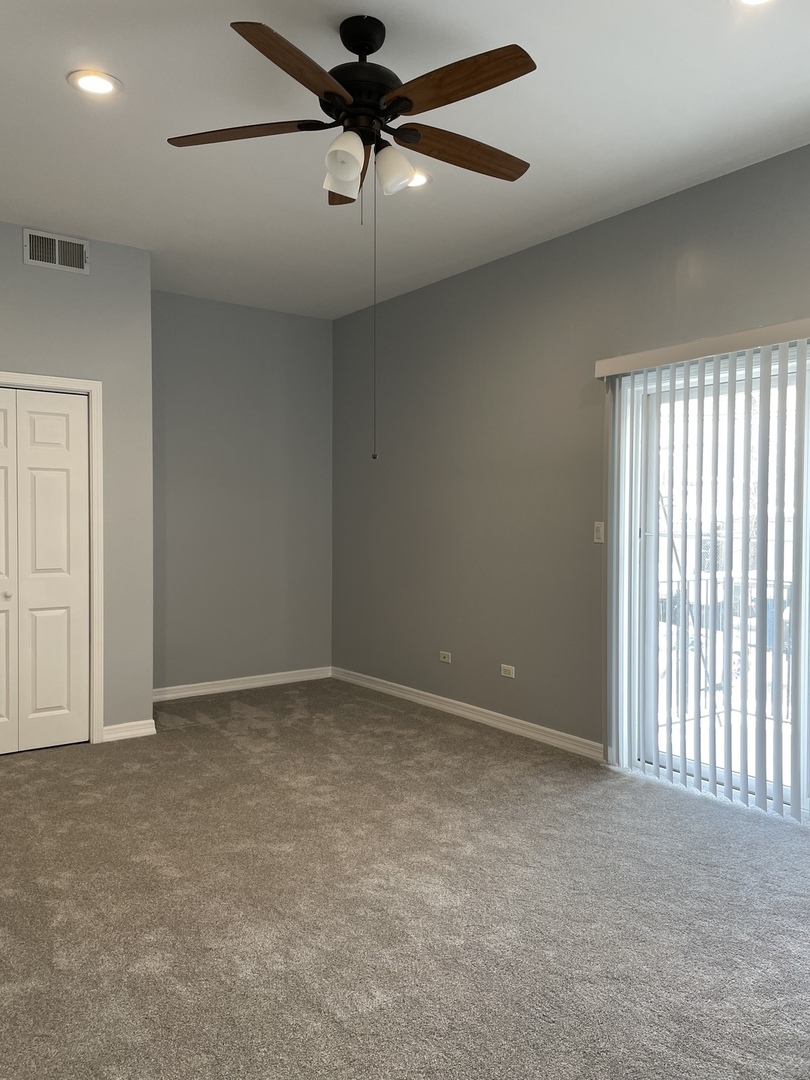 Undisclosed Address Chicago, IL 60642 - Photo 18 of 24 a view of an empty room with a window