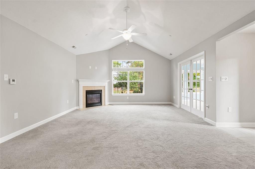 2002 Southview Drive Harmony, PA 16037 - Photo 12 of 47 an empty room with windows and fireplace