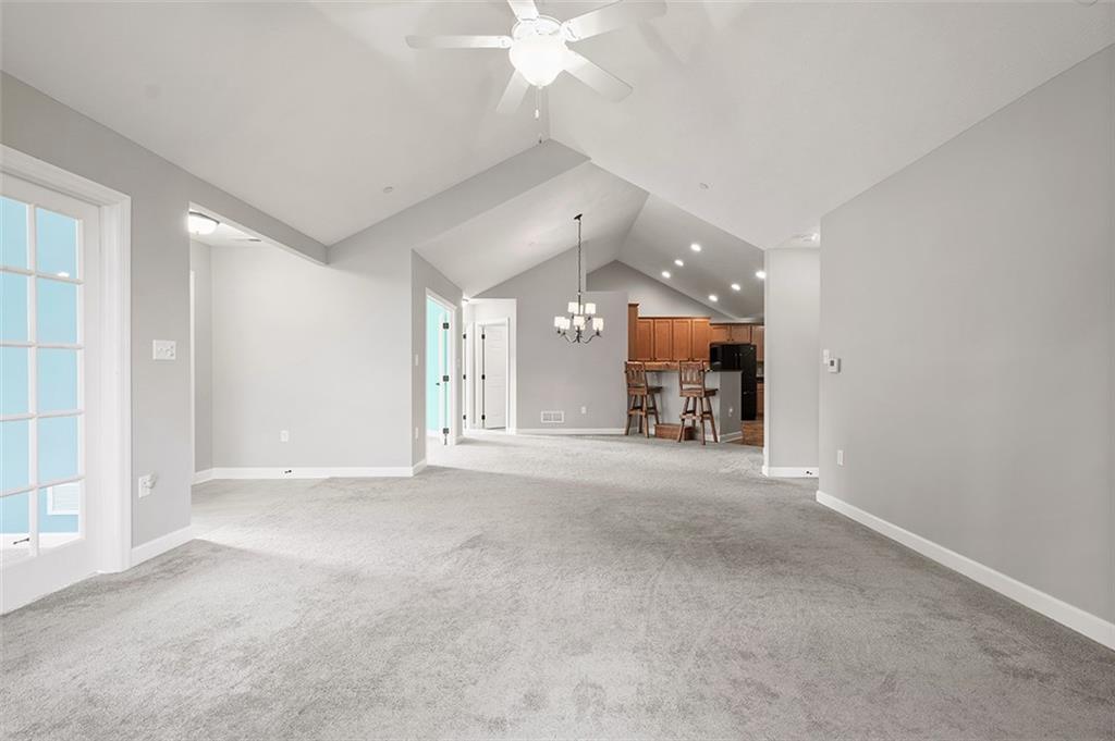 2002 Southview Drive Harmony, PA 16037 - Photo 14 of 47 en empty room with a furniture and a chandelier fan