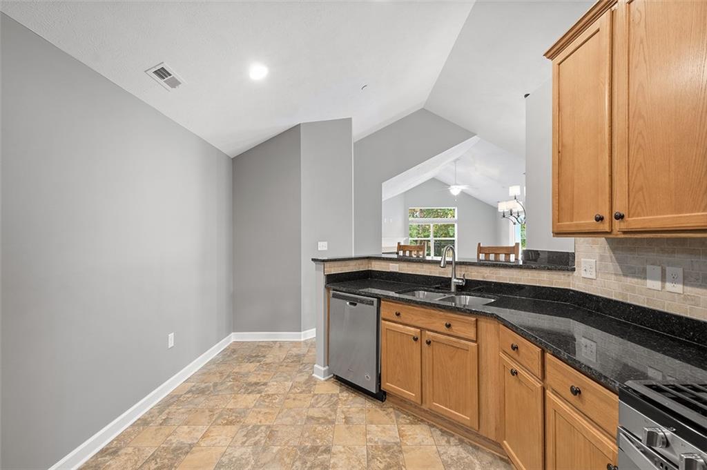 2002 Southview Drive Harmony, PA 16037 - Photo 25 of 47 a kitchen with granite countertop a sink and cabinets