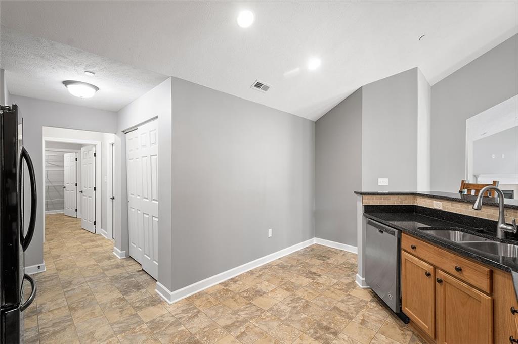 2002 Southview Drive Harmony, PA 16037 - Photo 26 of 47 a kitchen with a sink and cabinets