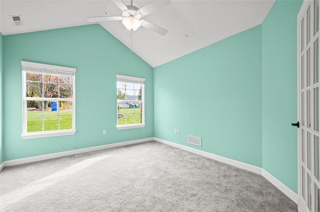 2002 Southview Drive Harmony, PA 16037 - Photo 31 of 47 an empty room with windows and fan