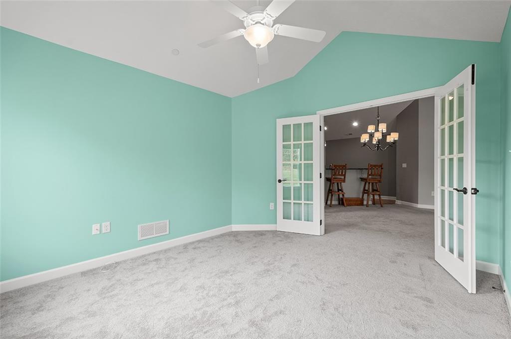 2002 Southview Drive Harmony, PA 16037 - Photo 32 of 47 an empty room with closet and a chandelier fan