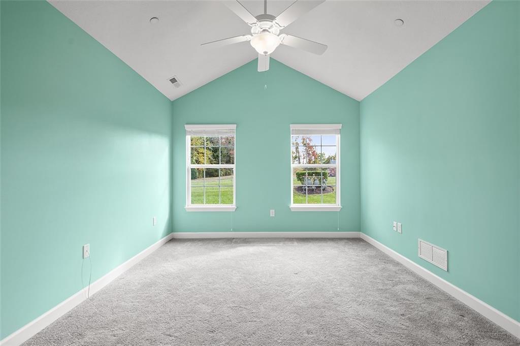 2002 Southview Drive Harmony, PA 16037 - Photo 33 of 47 an empty room with a window and ceiling fan