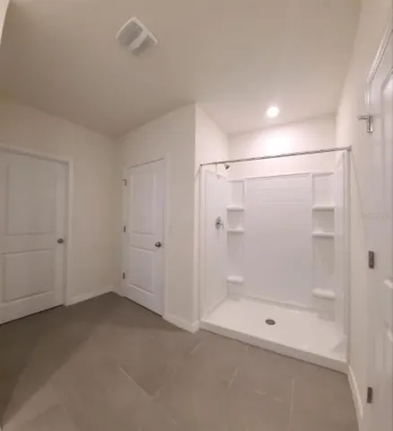 a view of a room with racks on the wall