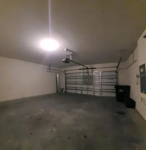 a view of a porch next to a yard