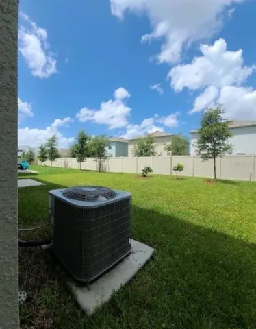 a view of a garden with a fountain