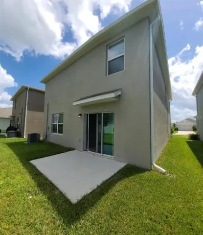 a street view with a garden and entertaining space