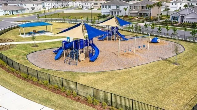 an aerial view of a house with a garden