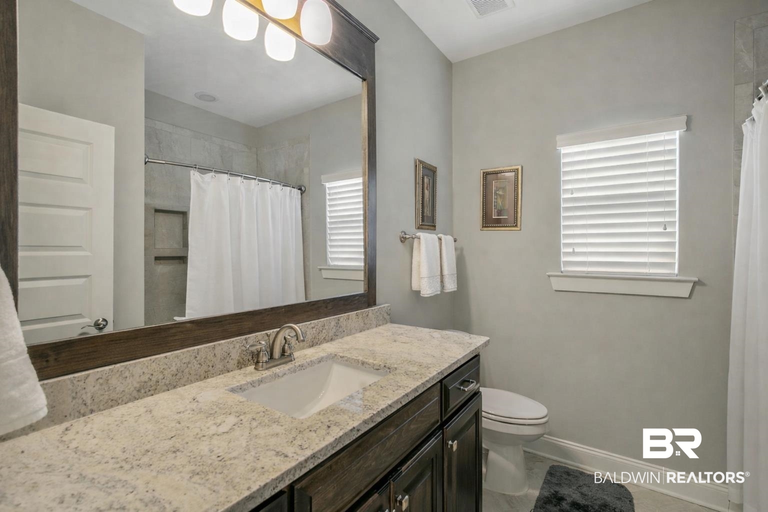 31911 Bobwhite Road Daphne, AL 36527 - Photo 85 of 85 Full bathroom featuring vanity and a shower with curtain