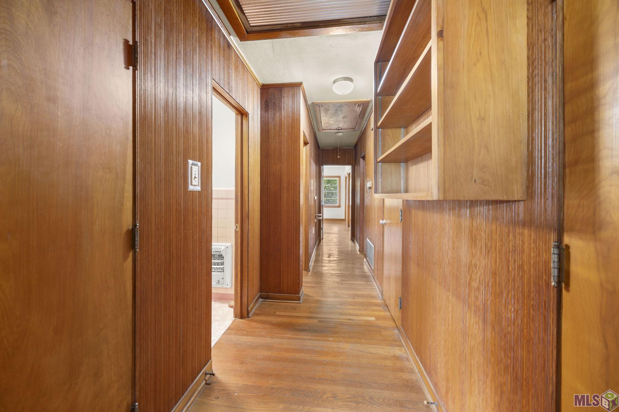 9372 Woodbine Street Baton Rouge, LA 70815 - Photo 19 of 23 Long Hallway with Storage