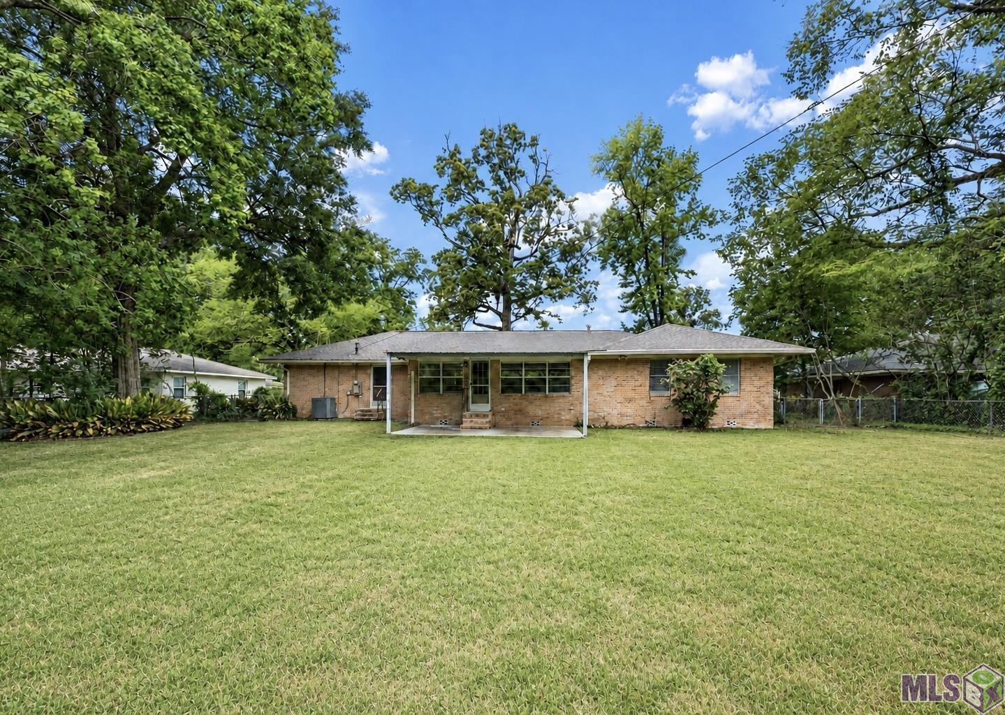 9372 Woodbine Street Baton Rouge, LA 70815 - Photo 22 of 23 Back of House from Fence