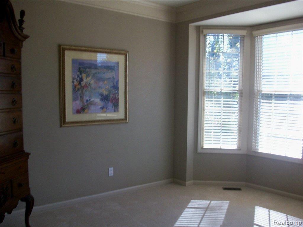 1892 Dunham Drive, Unit 14 Rochester, MI 48306 - Photo 11 of 20 dunham den.jpg