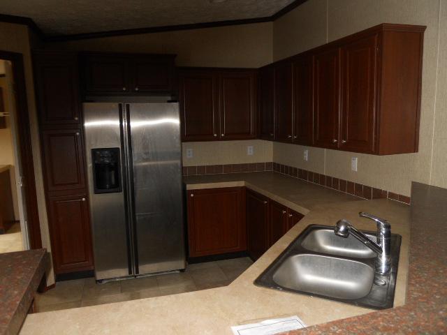 988 Coaling Road Charlotte, TN 37036 - Photo 5 of 19 KITCHEN CABINETS, REFRIGERATOR, SINK, LARGE STAINLESS REFRIGERATOR