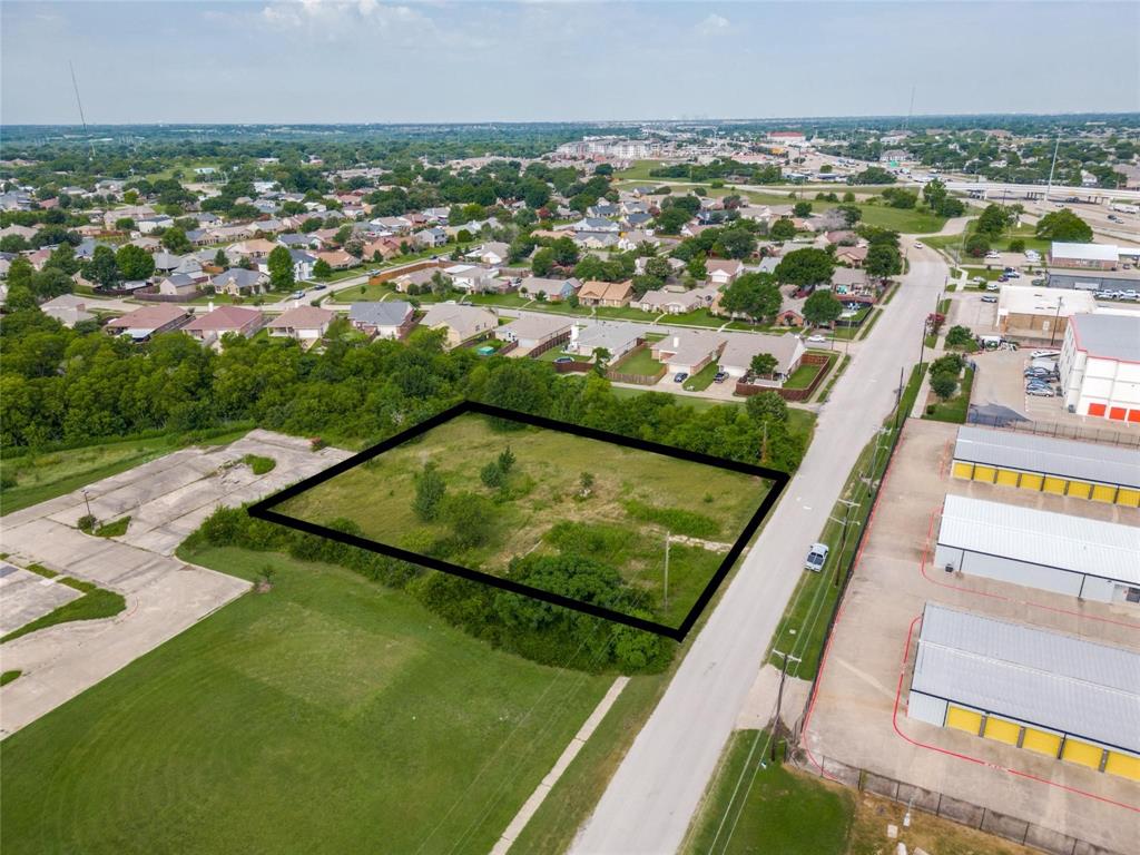 4926 Locust Grove Road Garland, TX 75043 - Photo 3 of 8 an aerial view of residential houses with outdoor space and swimming pool